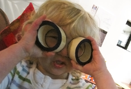 Emily playing with circular shapes.
