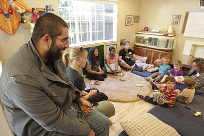 Parents attending class with their children.