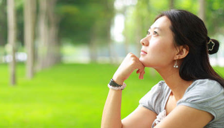 A woman pausing for reflection.